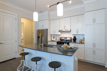 modern kitchen with quartz counters at Vickers Roswell - Roswell GA